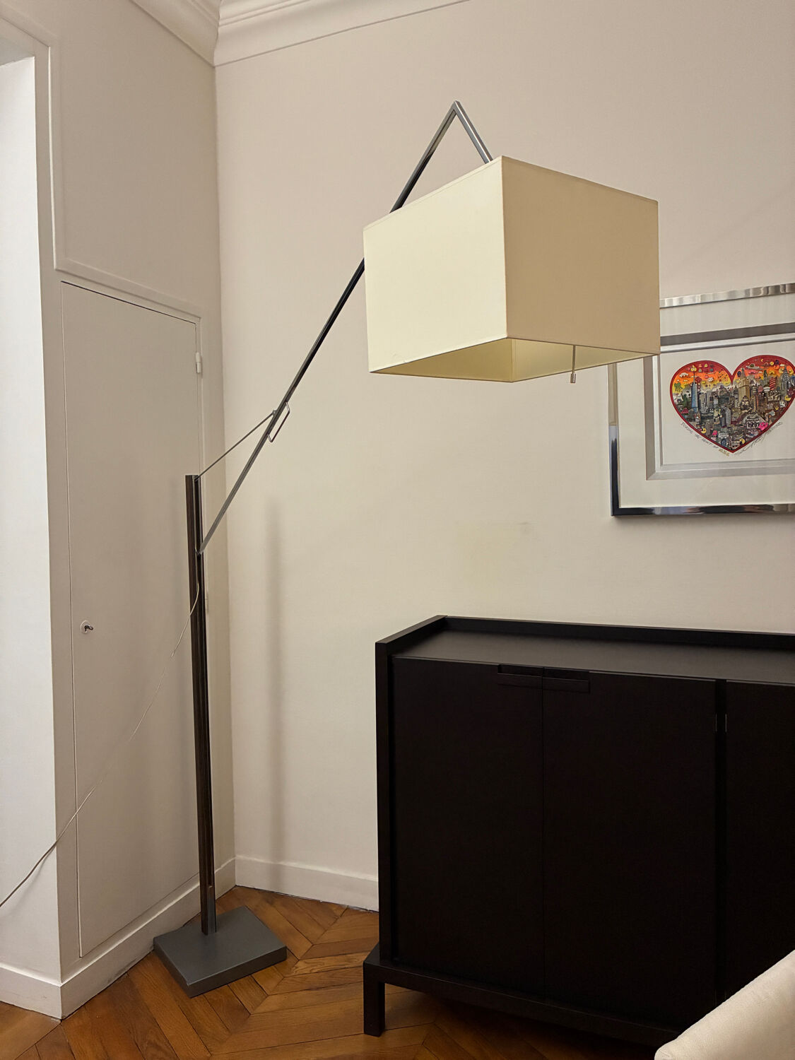 Cinna floor lamp in wood, chrome, and fabric.