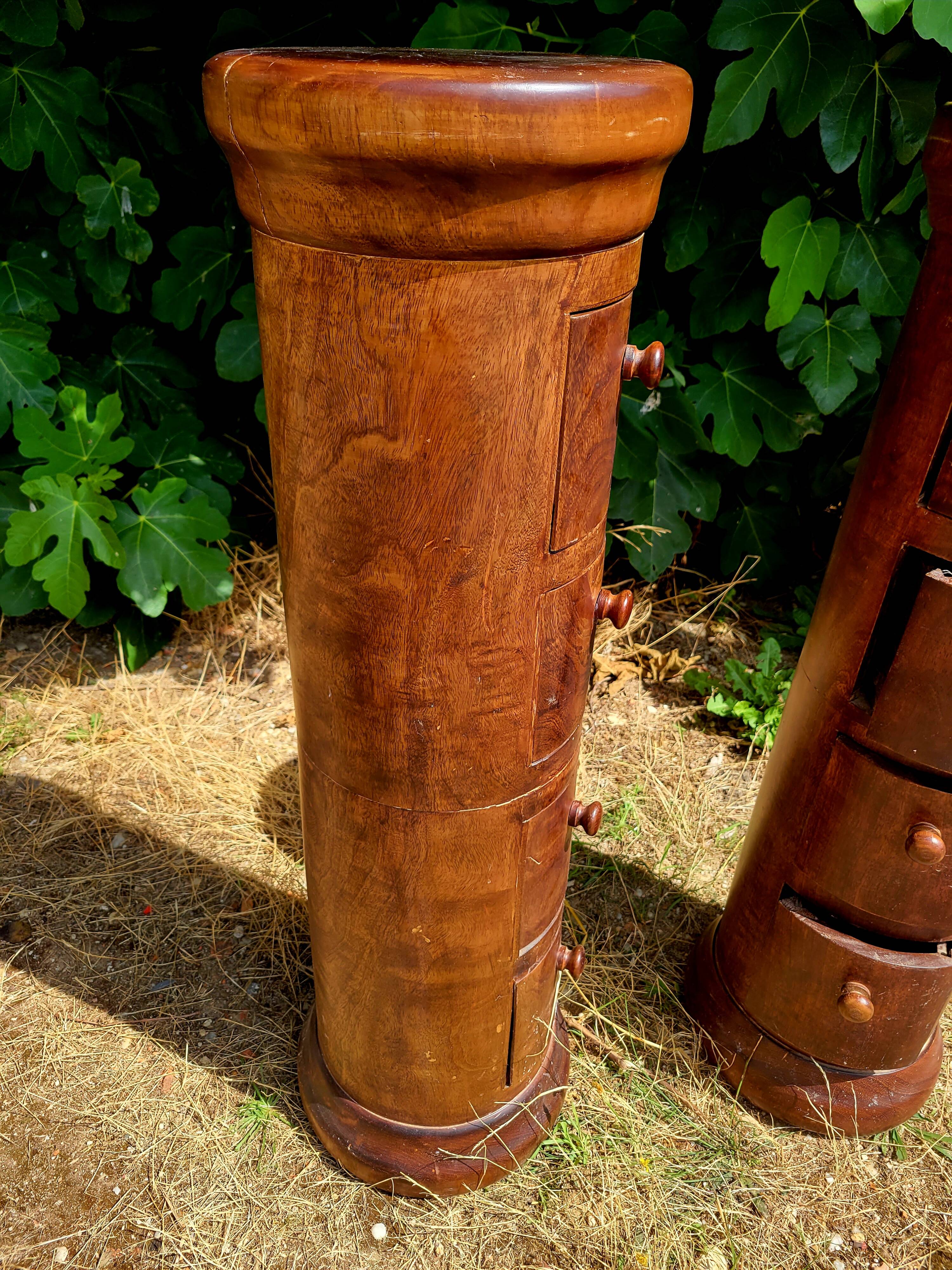 Pair of cylindrical furniture with drawers