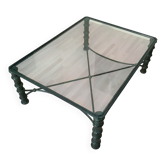 Vintage table in wrought iron with tempered glass top.