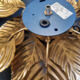 Pair of Masca flower wall lights in gold metal