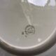 Vintage hollow serving dish with a decoration: marsh landscape.