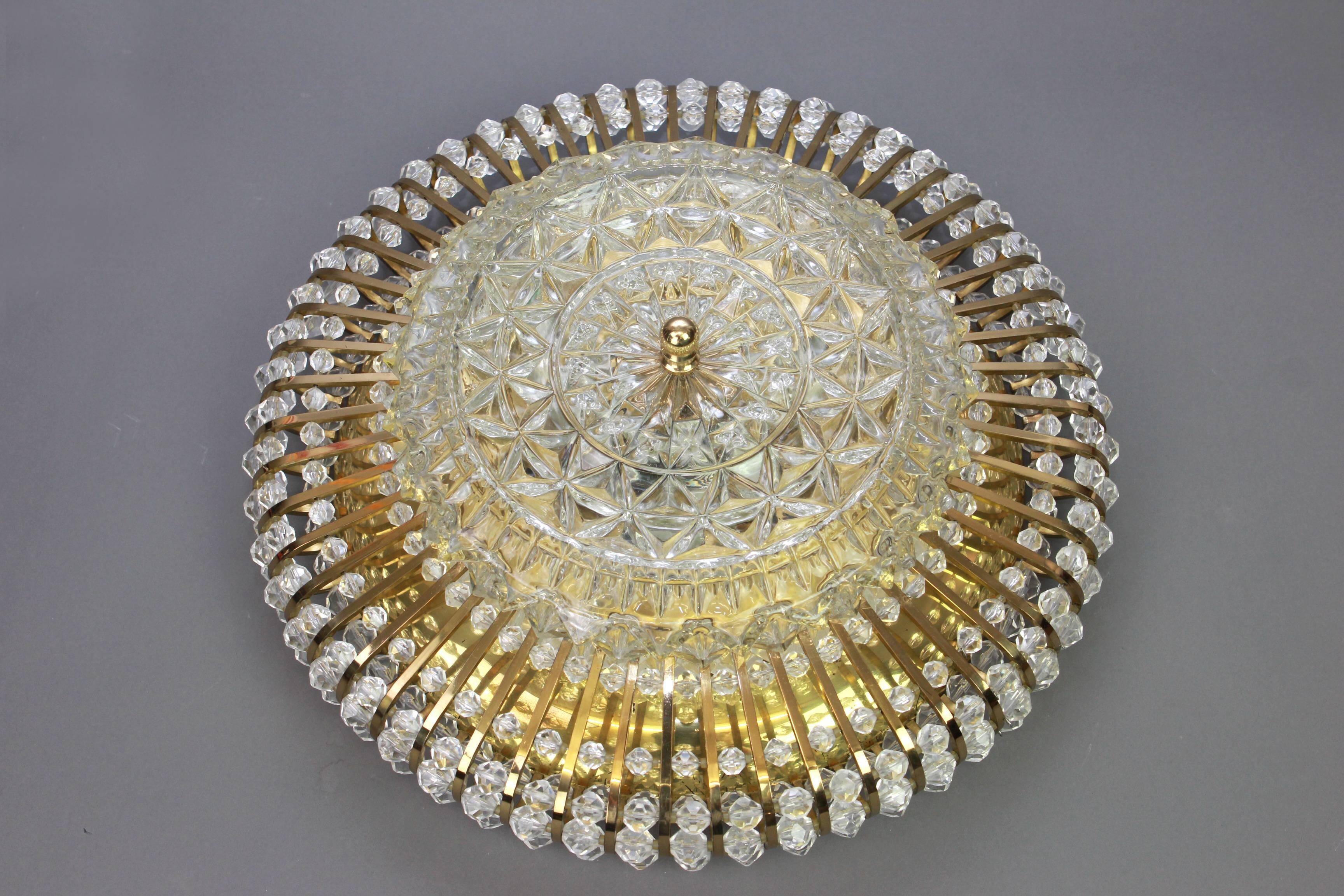 Hillebrand wall sconce in brass, glass, and Lucite beads, Germany, 1960s.