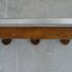 Wall-mounted coat rack made of turned wood imitating bamboo, 3 hooks.