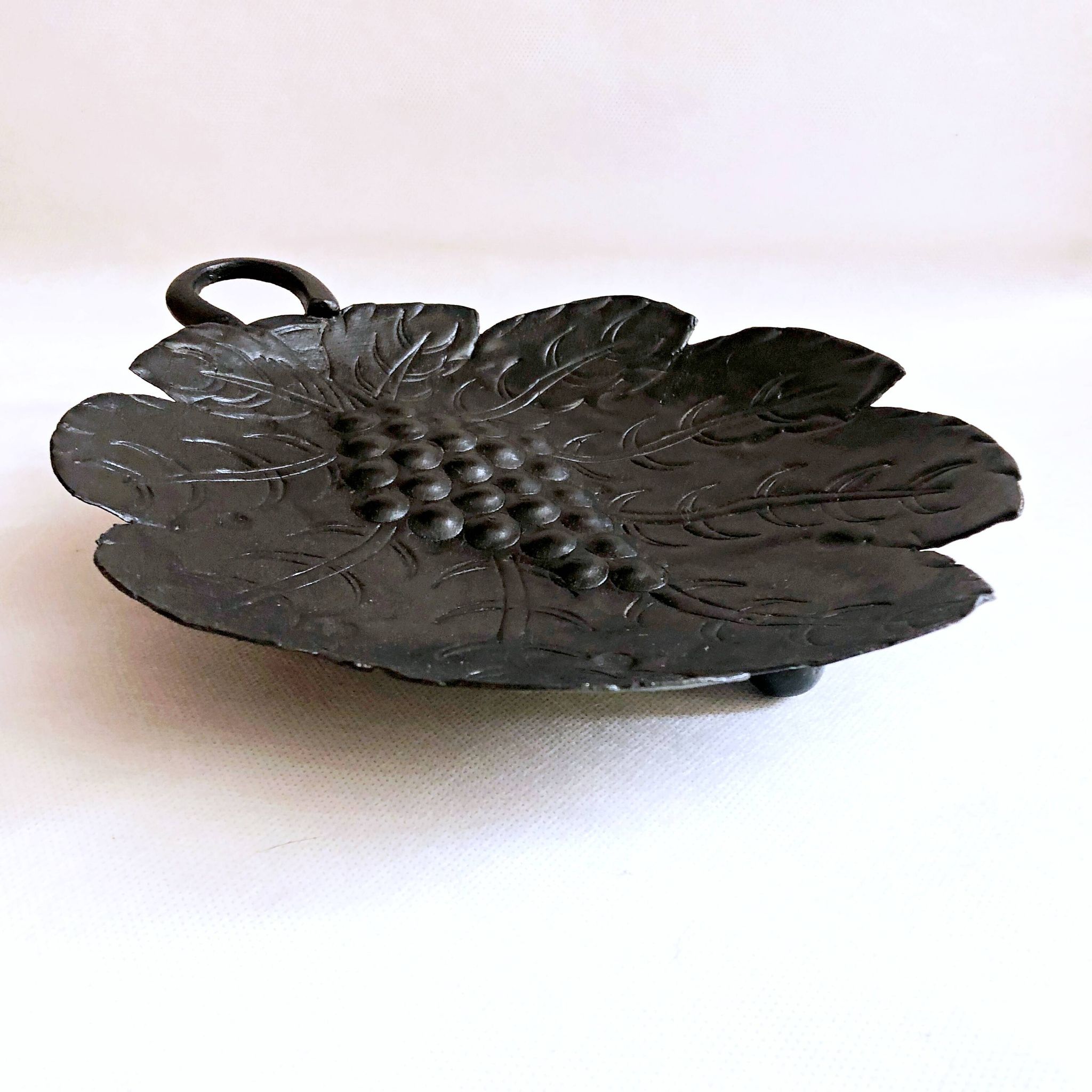 Artisanal embossed metal tripod dish