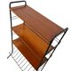 Vintage black shelf/coat rack with wooden accents.