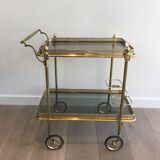Neoclassical style rolling table in brass with blue glass tops