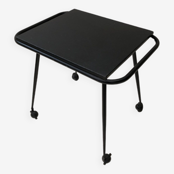 Black table on wheels from the 60s