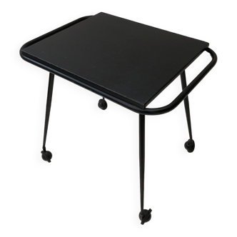 Black table on wheels from the 60s