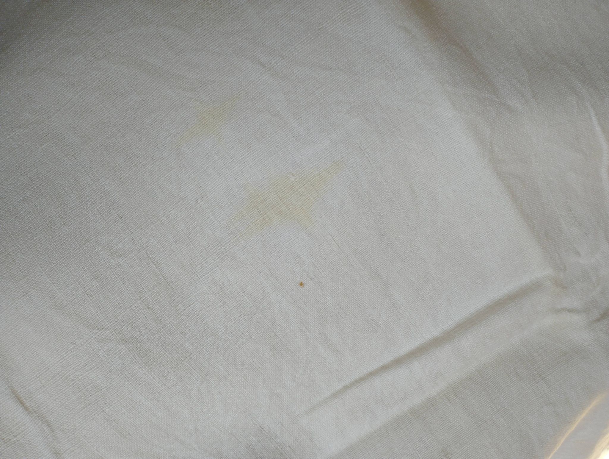 Antique linen tablecloth embroidered with flowers