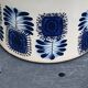 Grey sandstone pot with blue patterns and vintage liege cork 1970