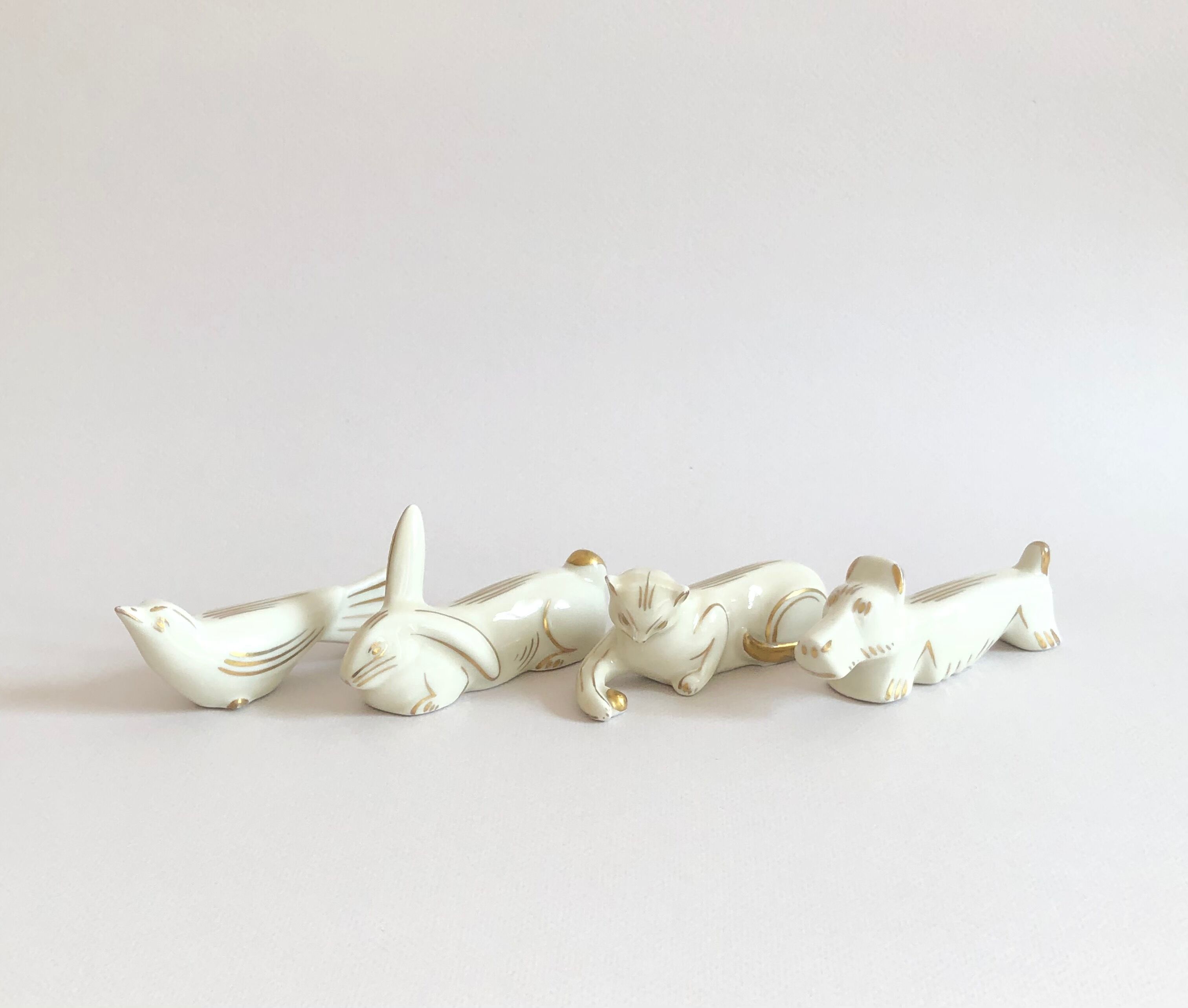 Set of 8 art deco ceramic animal knife holders