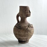 Ceramic woman face vase pitcher.