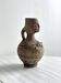 Ceramic woman face vase pitcher.