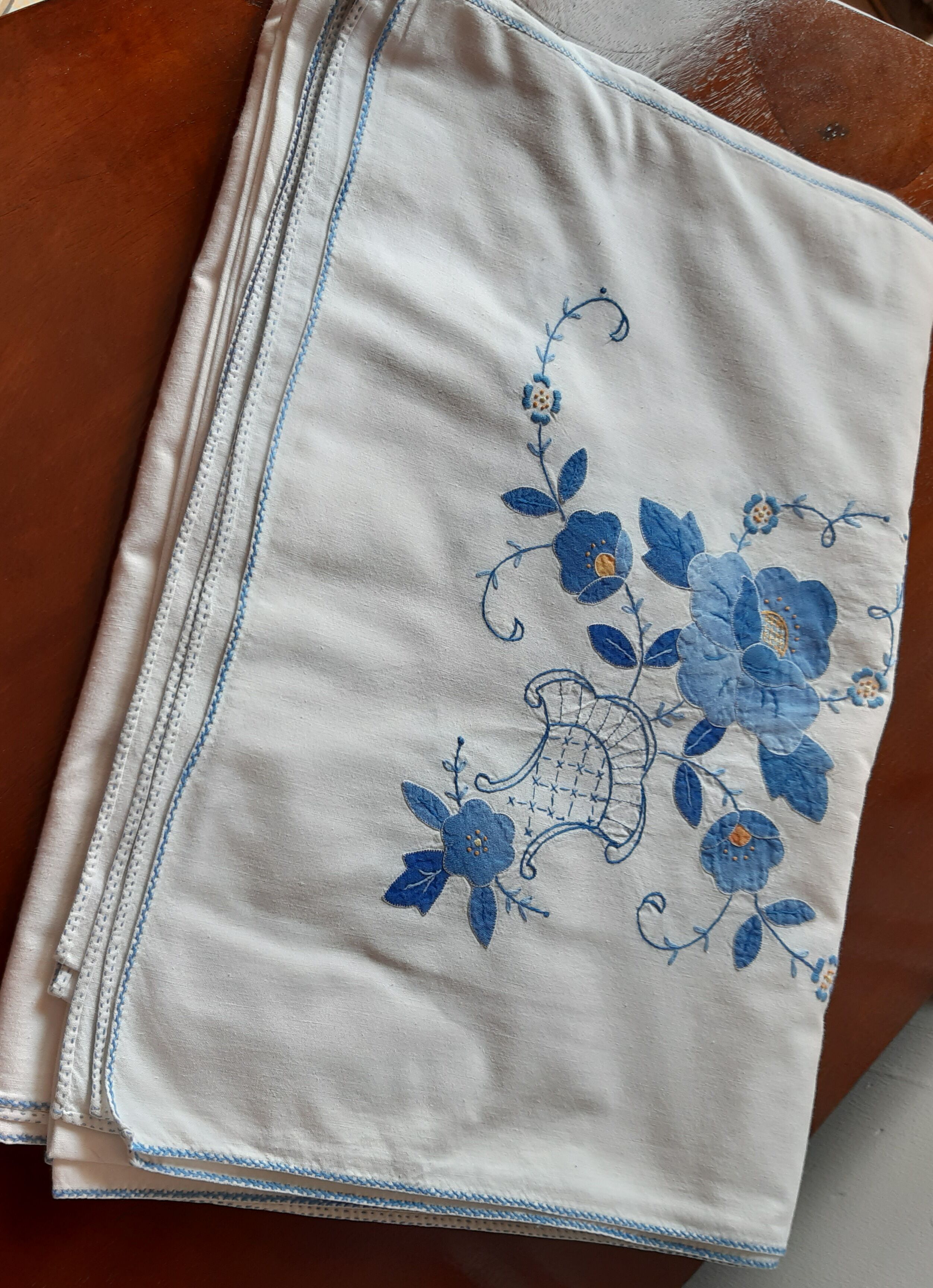 Blue hand embroidered coat with 12 towels