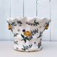 Bouquetière murale pique-fleurs porcelaine