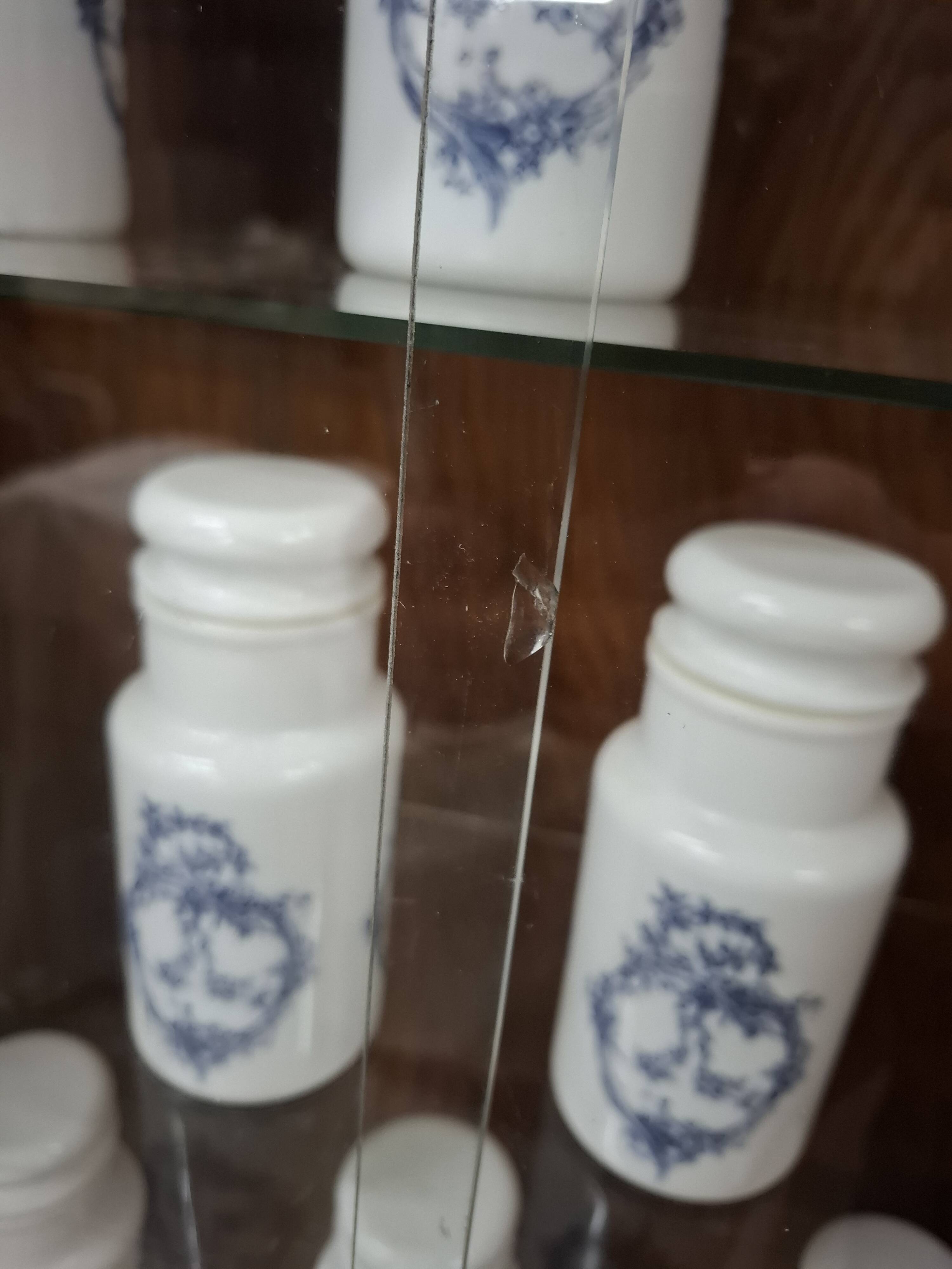 Vintage glass-fronted cabinet, bookshelf.