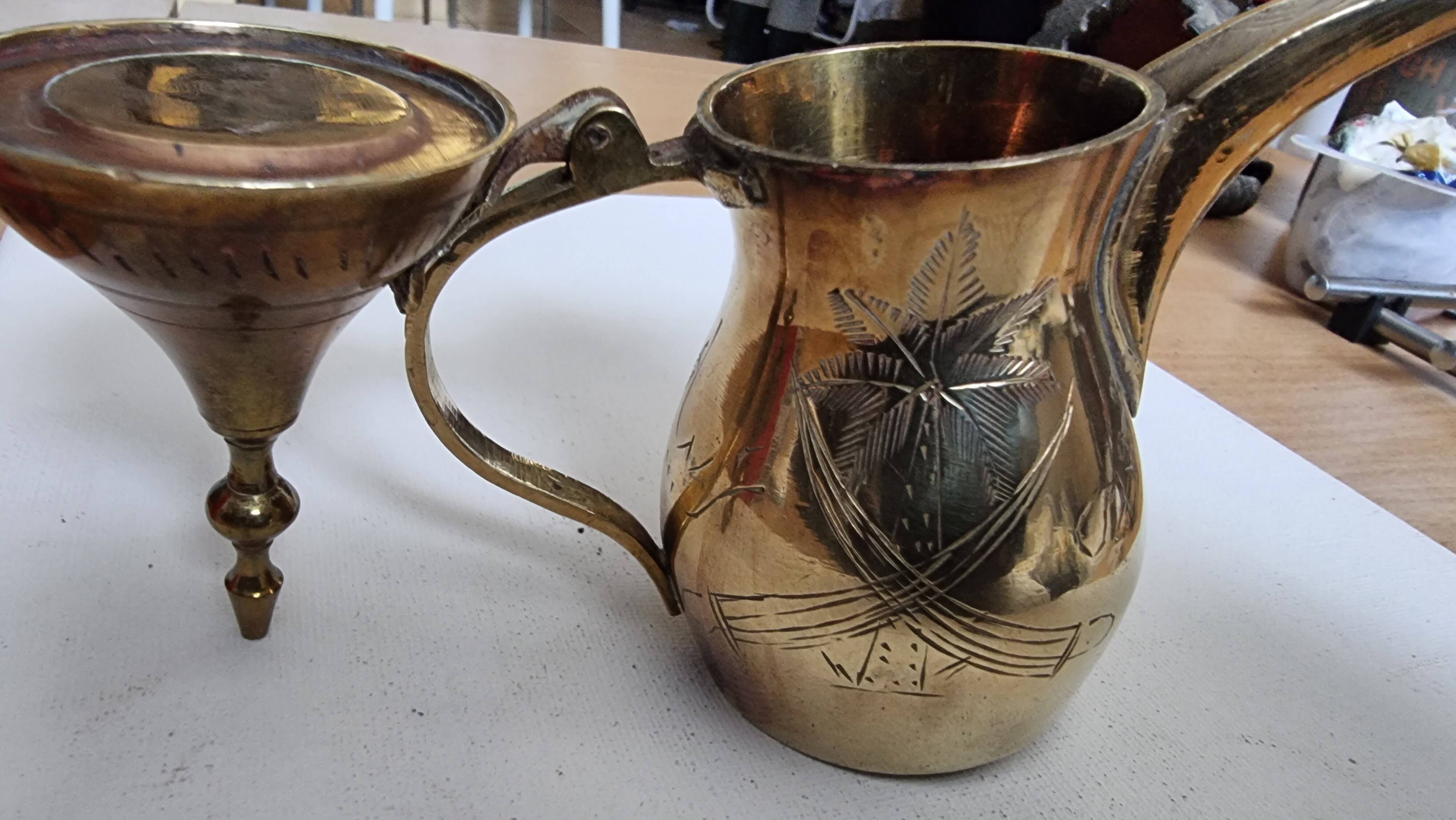 Small carved brass pourer