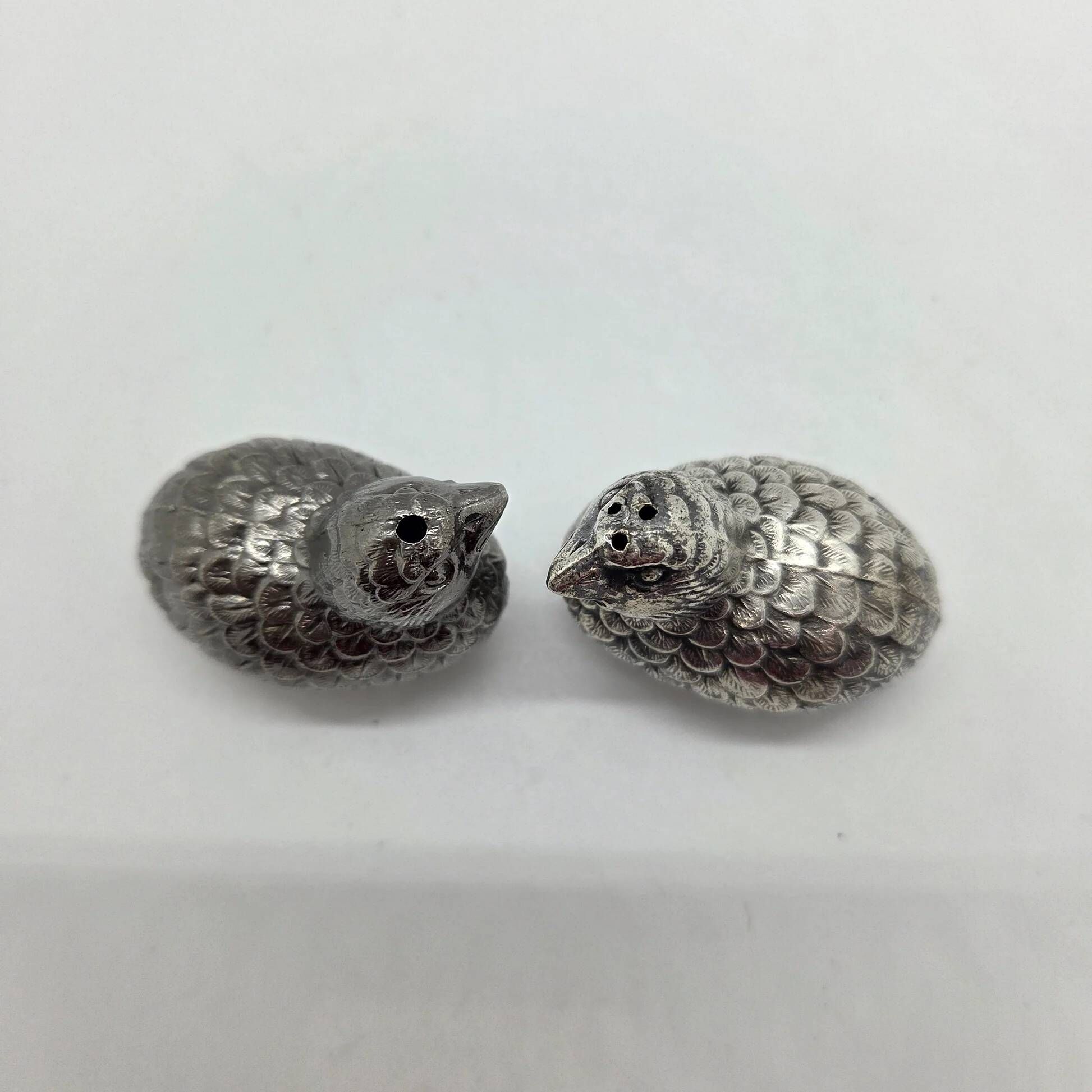 Pair of silver-plated metal bird salt and pepper shakers