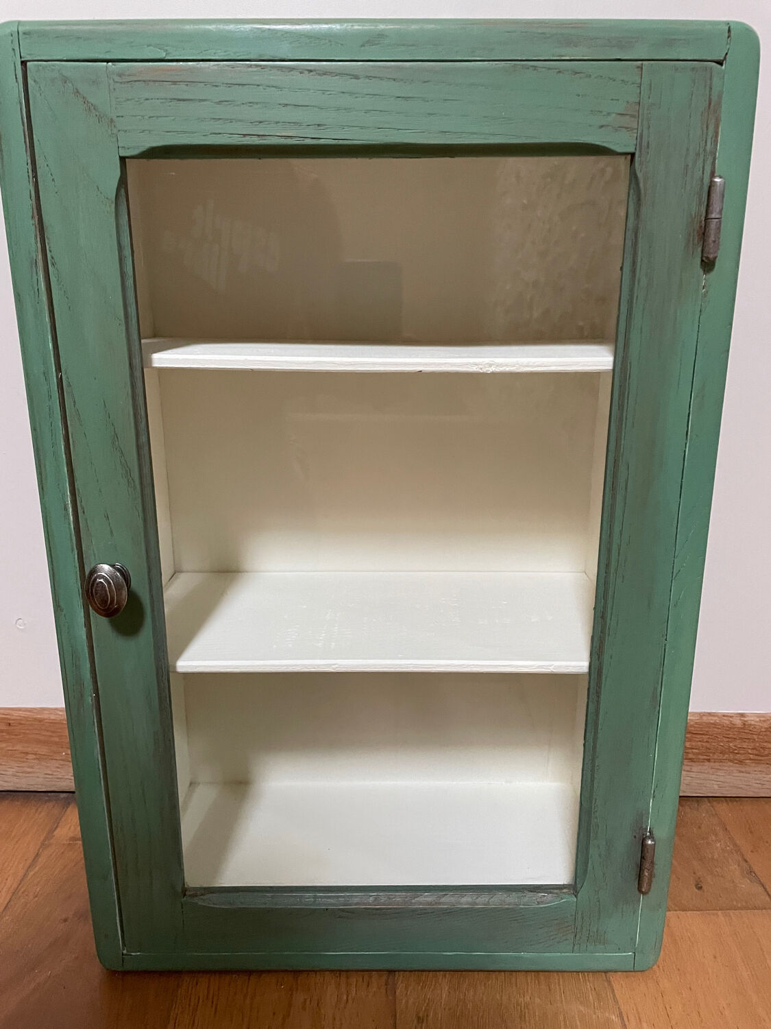 Small wooden cabinet patinated arsenic green