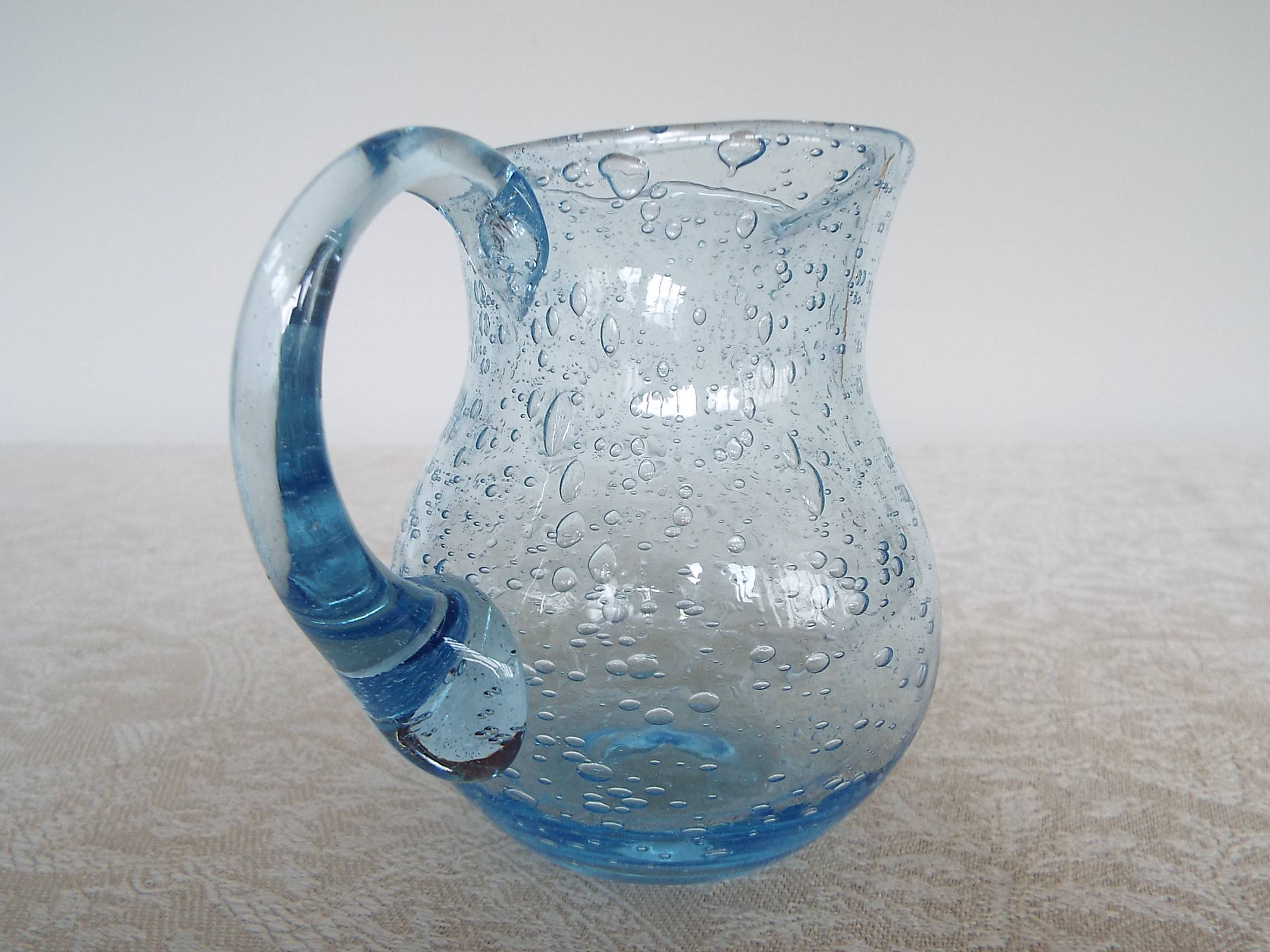 Bulled glass pitcher