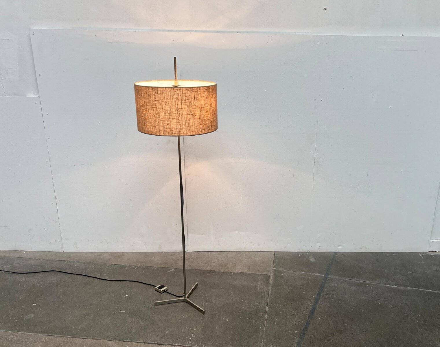 Minimalist German tripod floor lamp from the mid-century, 1960s.