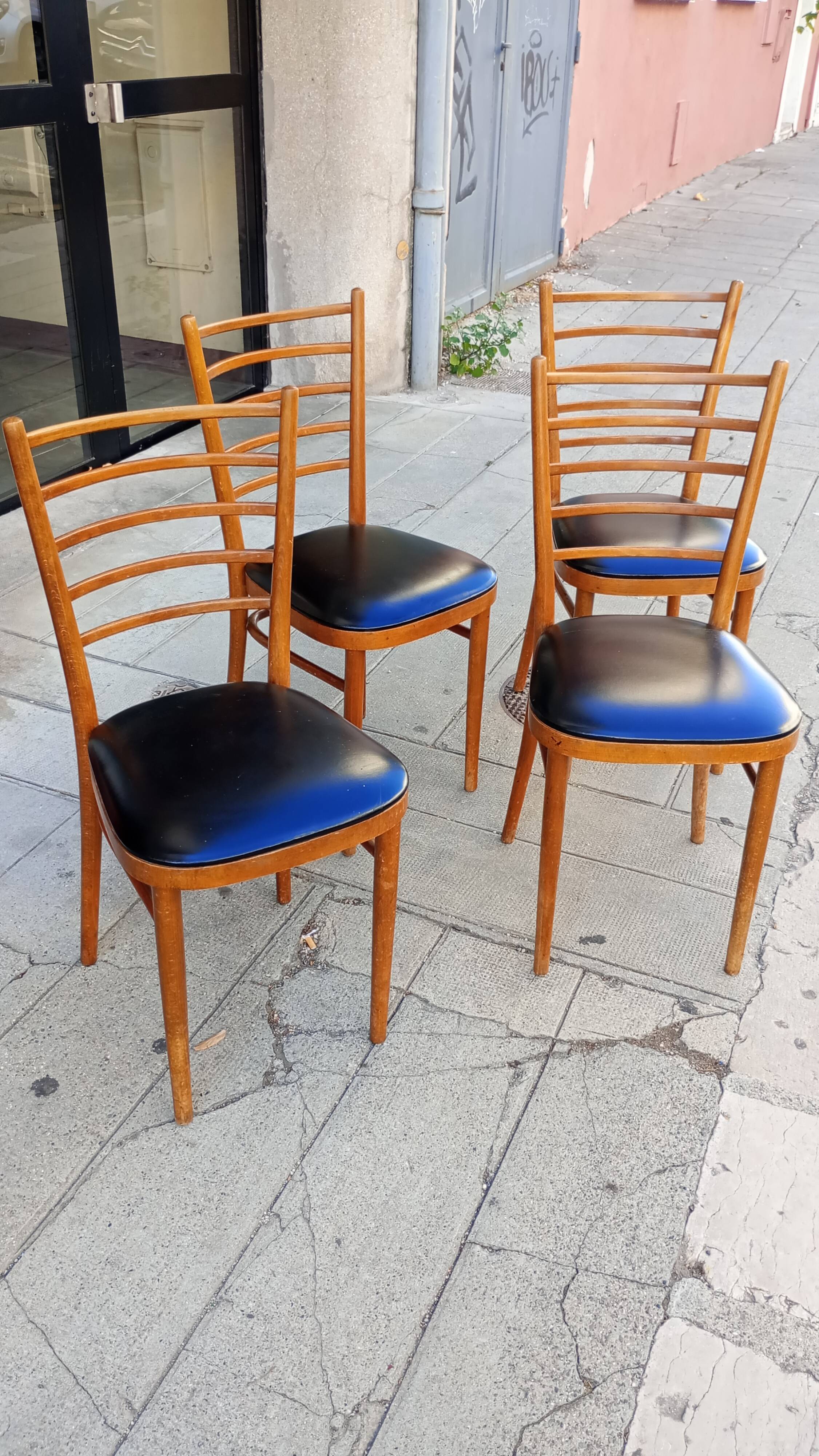 Lot of four antique chairs. Bistro. 1960.
