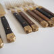 Set of old dessert cutlery in wood and brass