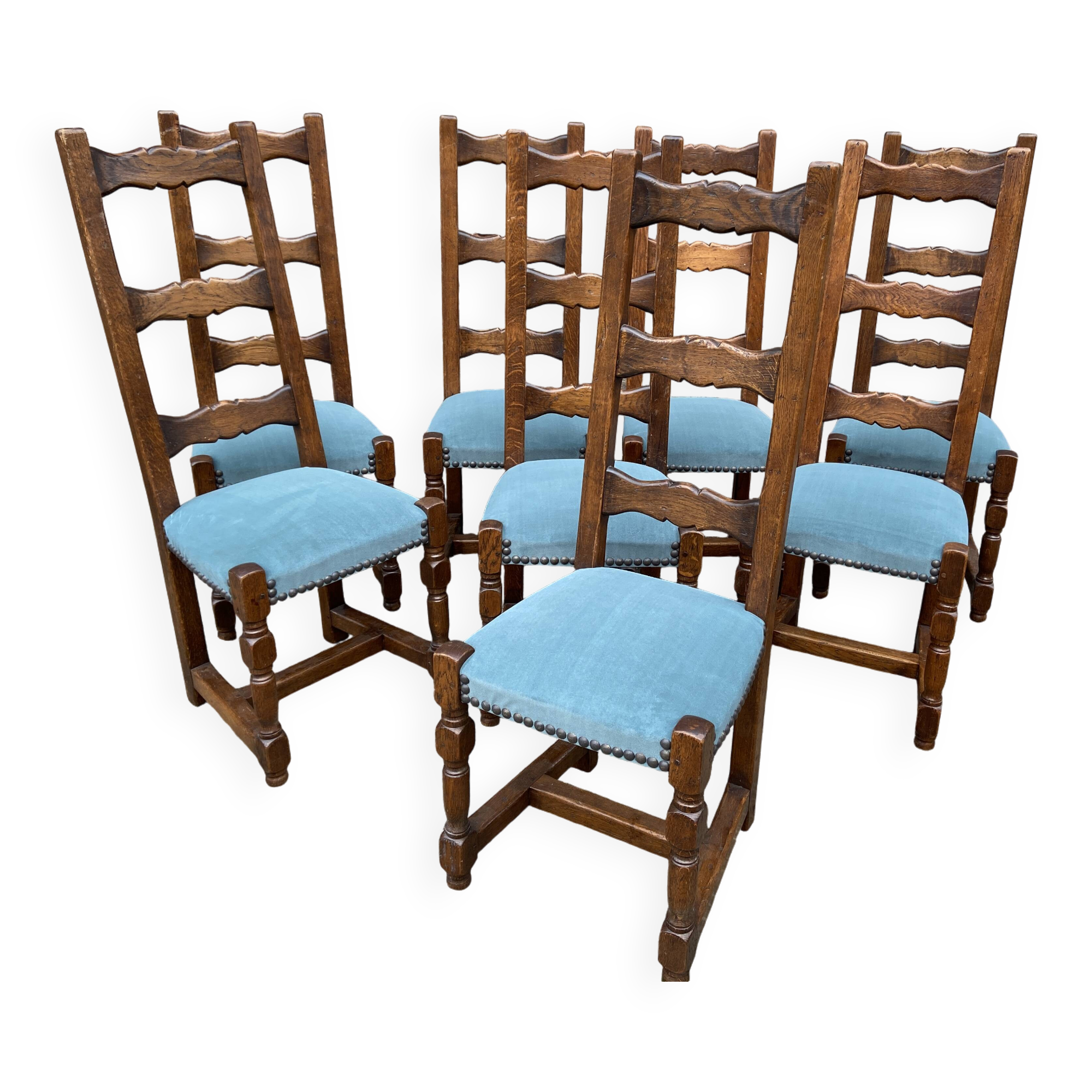 8 vintage Spanish renaissance chairs