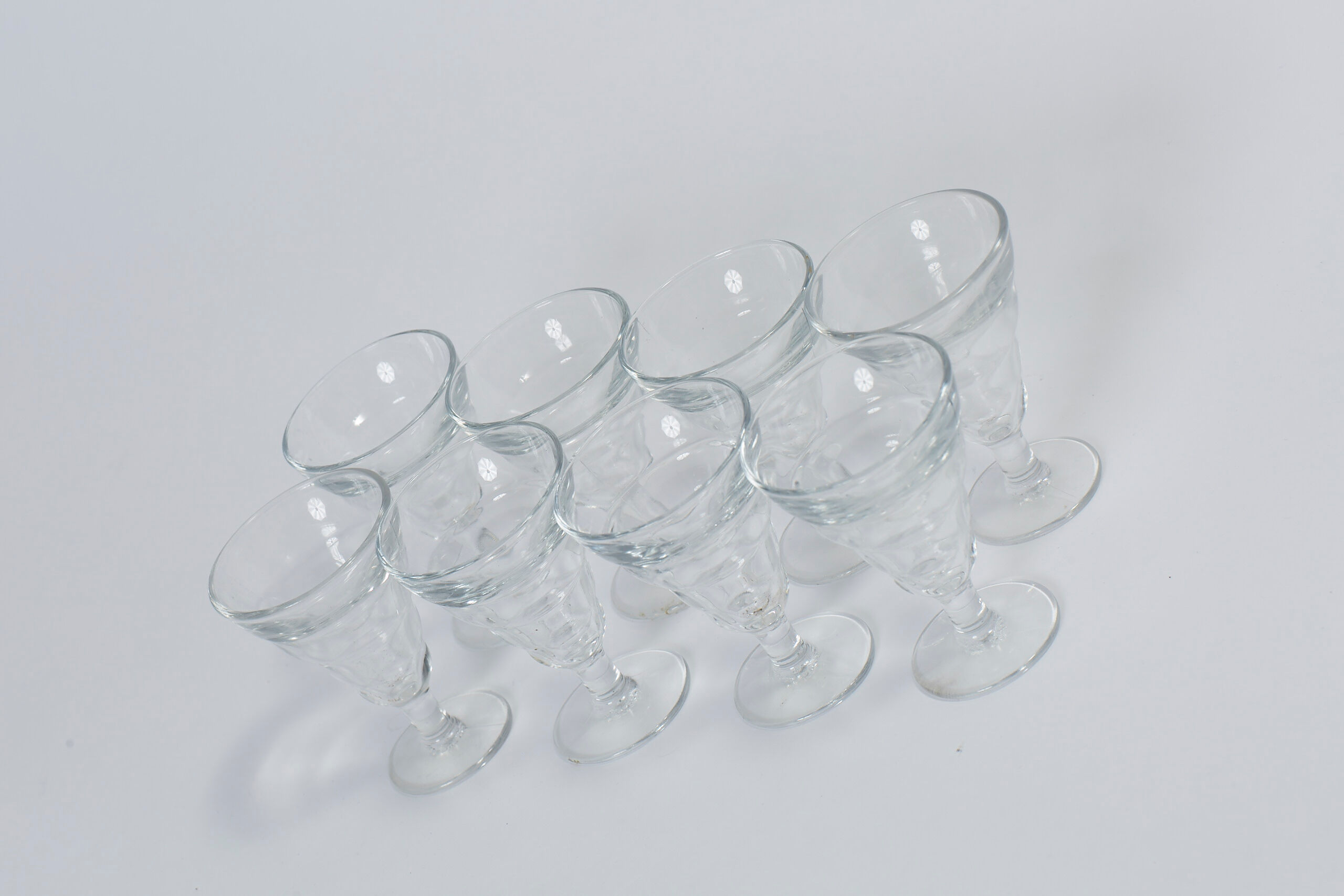 lot of bistro glasses on foot
