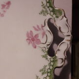 Porcelain dish decorated with handles