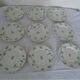 9 plates dessert porcelain of Limoges decorated with small blue flowers