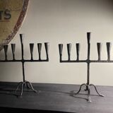 Pair of beaten iron candlesticks