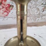 Brass push candle holder on frame