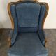 Pair of Louis XV style wingback armchairs in blue velvet.