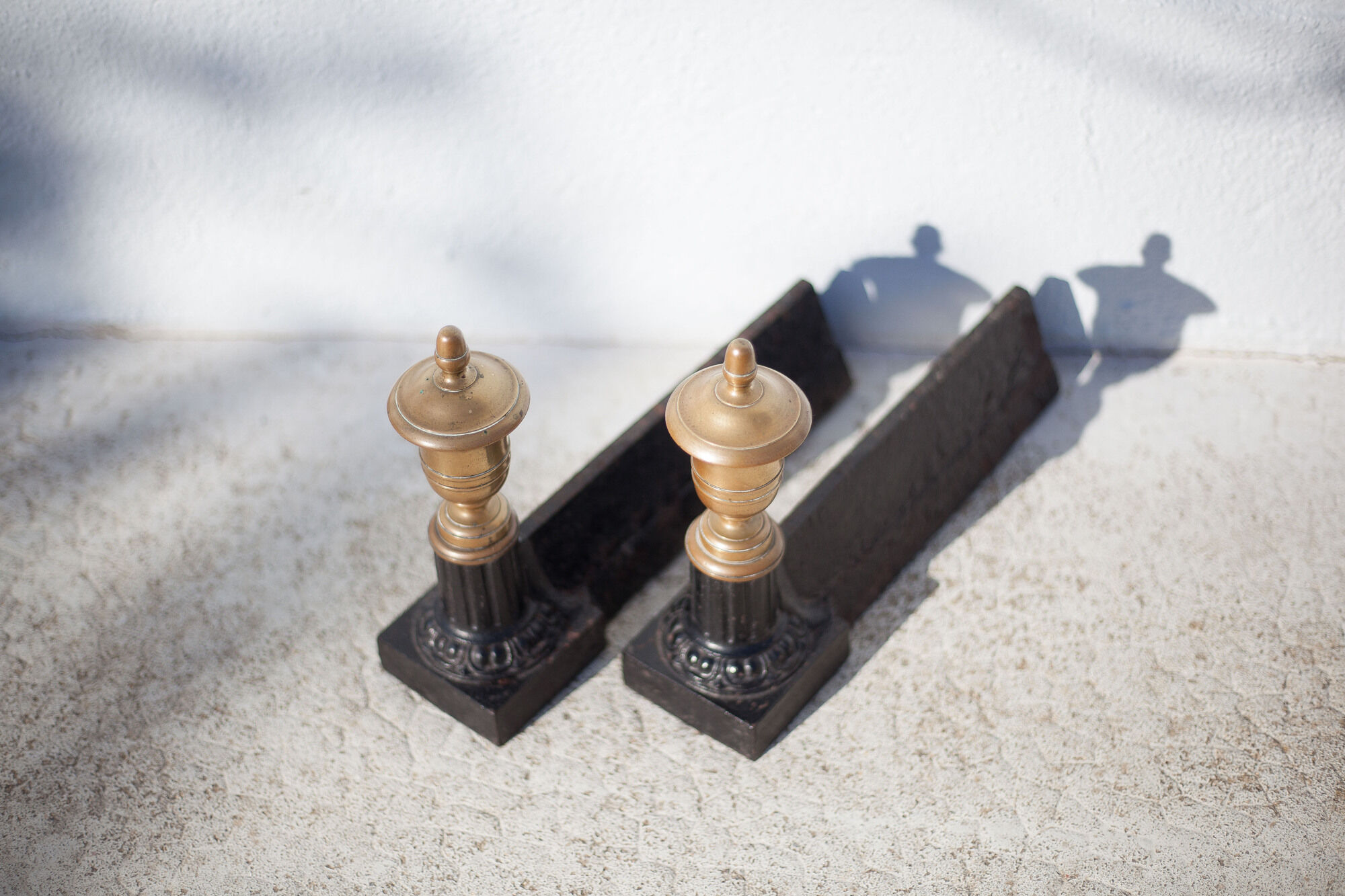Cast iron and brass chenets