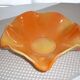Yellow and orange ceramic salad dish