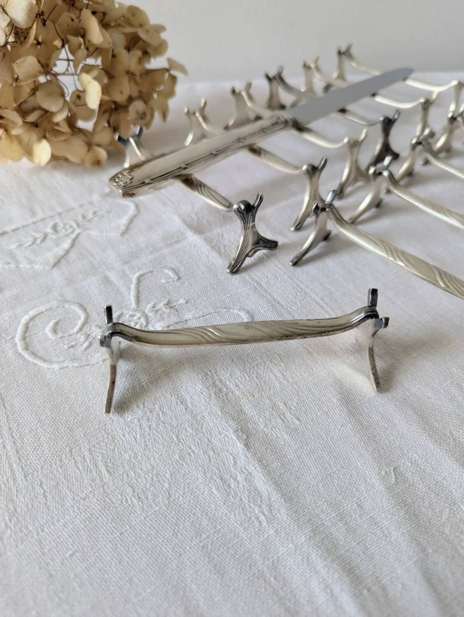 Set of 12 Christofle knife rests, Moderne 1912 model