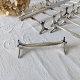 Set of 12 Christofle knife rests, Moderne 1912 model