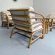Complete living room with rattan sofa and white bouclette, brass finish, 80's design