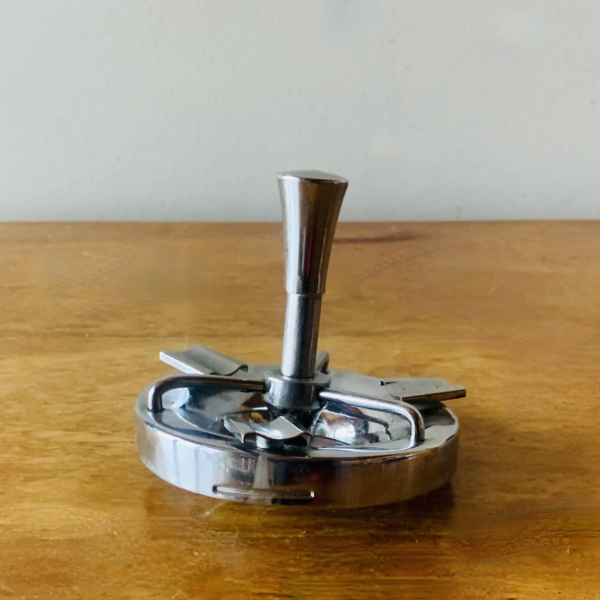 Vintage metal ashtray - push up
