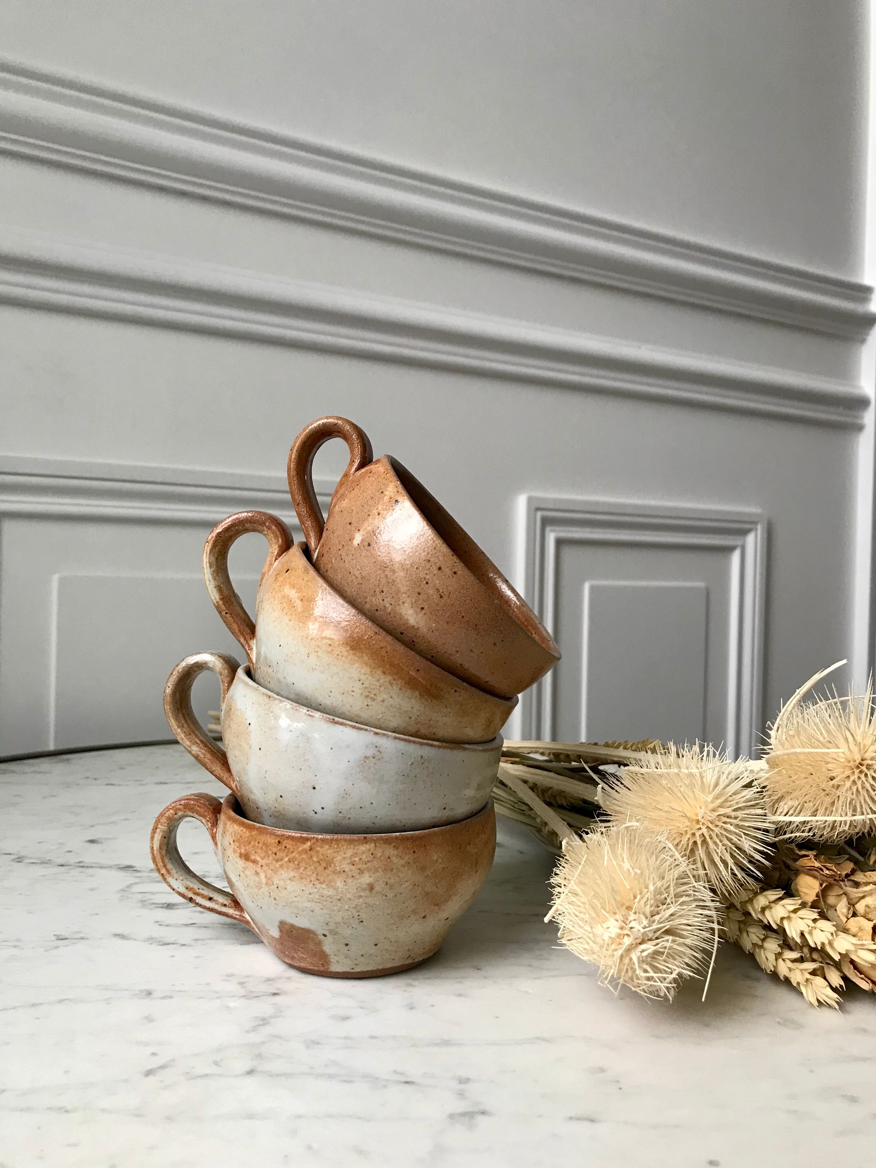 Lot of 4 coffee cups in sandstone