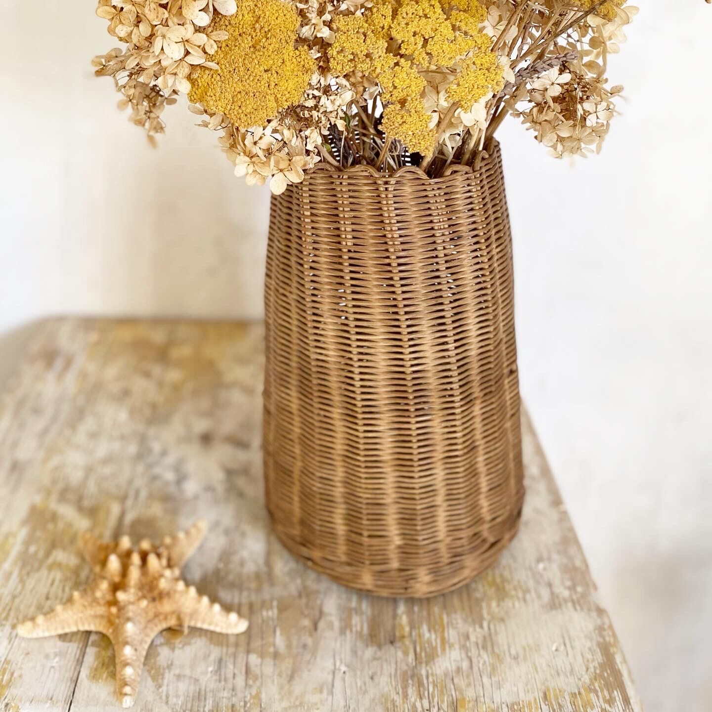Scalloped rattan vase