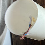 Mother-of-pearl and brass pendant with floral decoration.