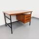 Vintage modernist double-sided desk in mahogany and black metal from the 1960s