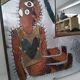 Curious riveted metal mirror 40x40cm