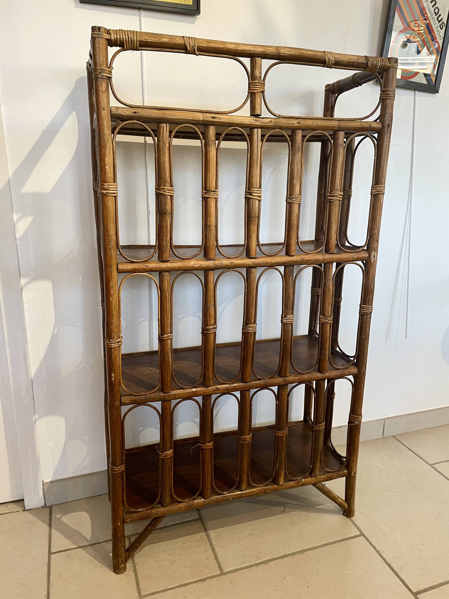 Shelf on rattan and bamboo legs from the 70s