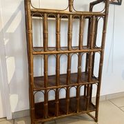 Shelf on rattan and bamboo legs from the 70s