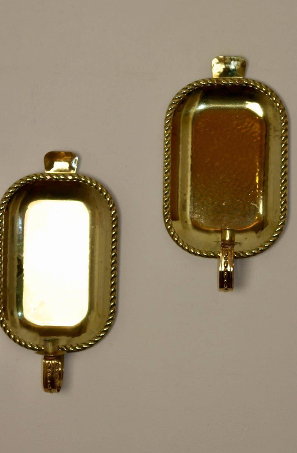 Pair of Swedish brass wall sconces from the mid-century.