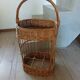 Panier porte bouteilles ancien en rotin