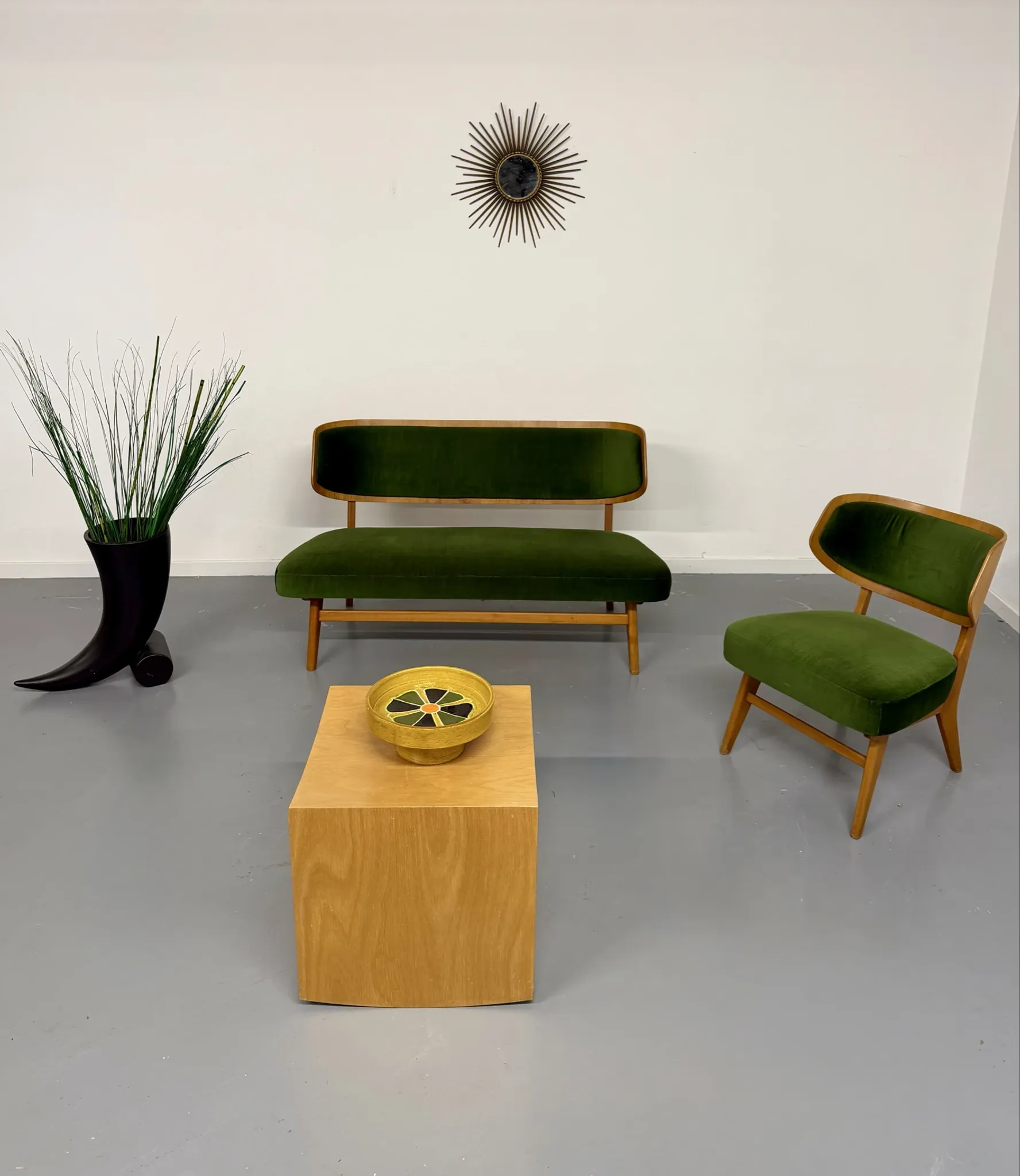 Sofa and armchair designed by Herta-Maria Witzemann, moulded wood, 1960s.